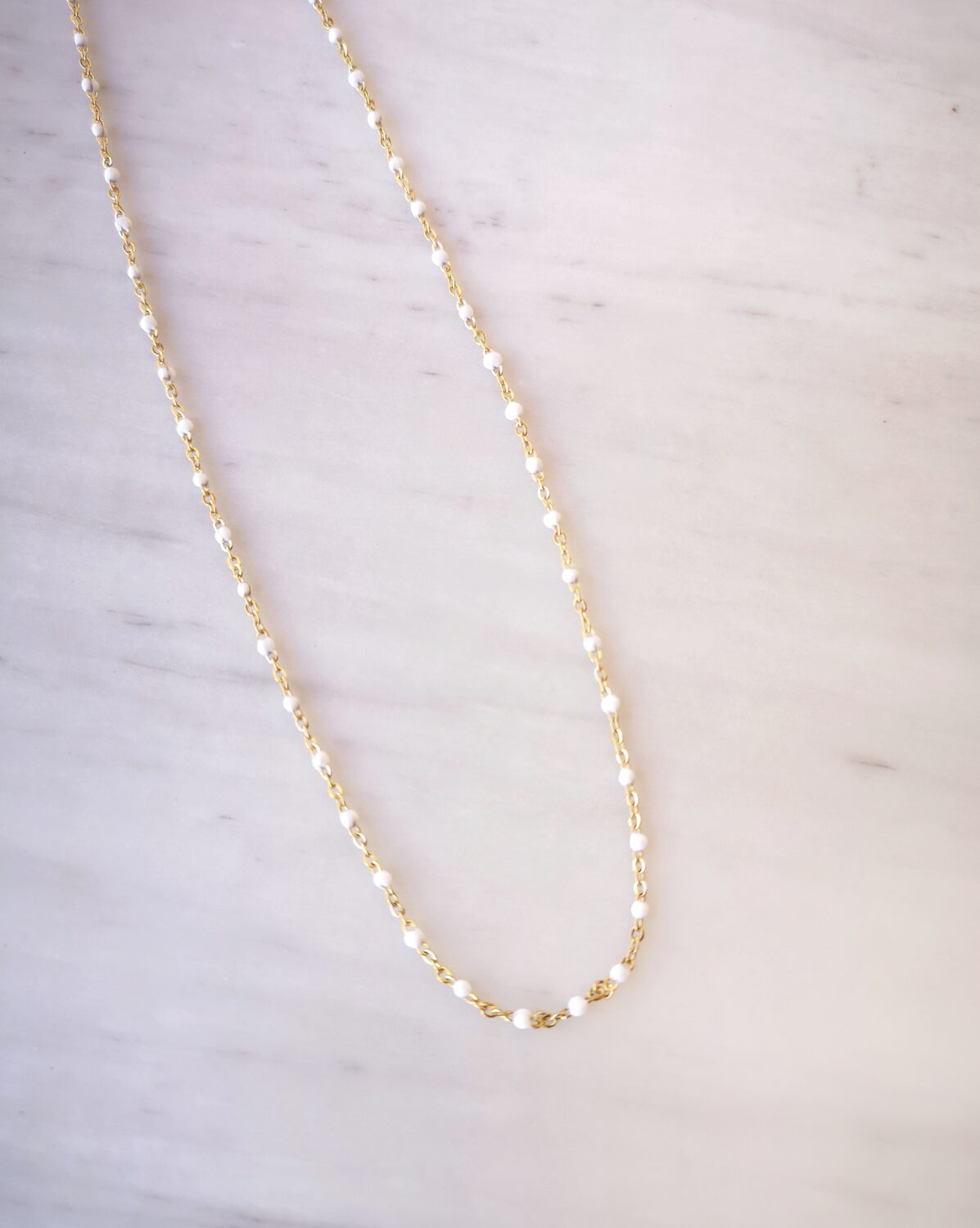 white rosary necklace